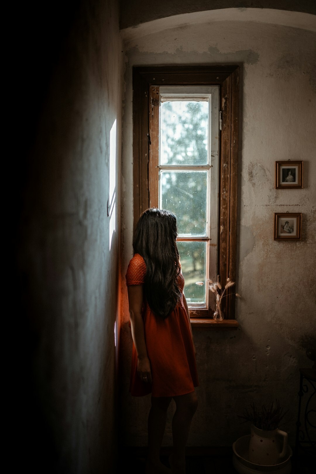 person exploring old house