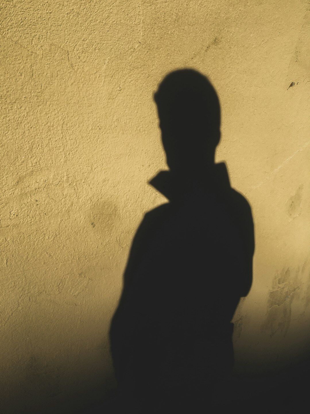 mysterious man in shadow
